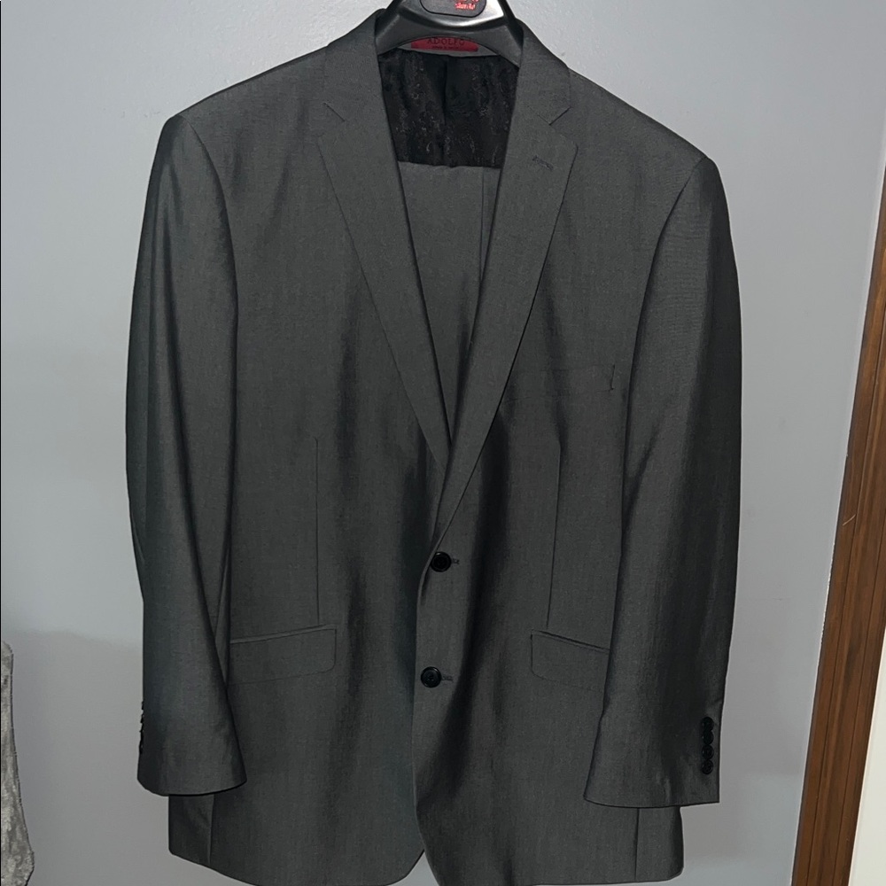Adolfo suit.
